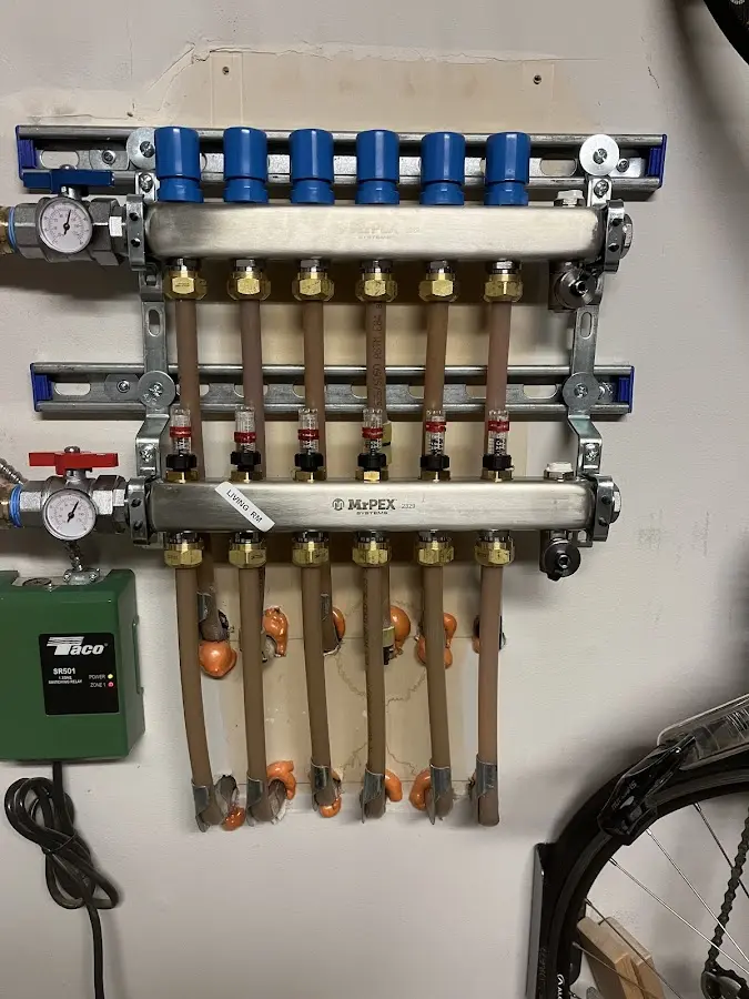 Plumber performing Water Heater Repair at a residential property in Pleasant Grove